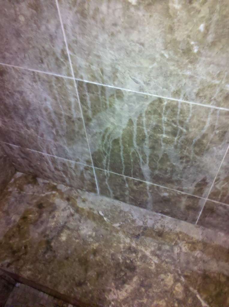 Etched Emperador brown marble Sudbury shower walls