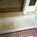 Brookline Marble stairs half honed and half soiled