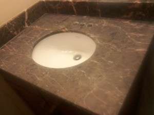 Emperador Brown marble vanity overall before polish dull