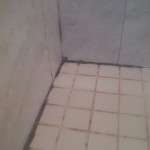 SHOWER FLOOR CLOSE UP BEFORE REGROUT