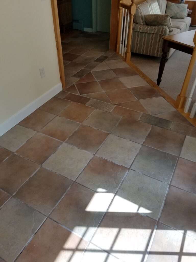 Tile floor with grout lines looking faded