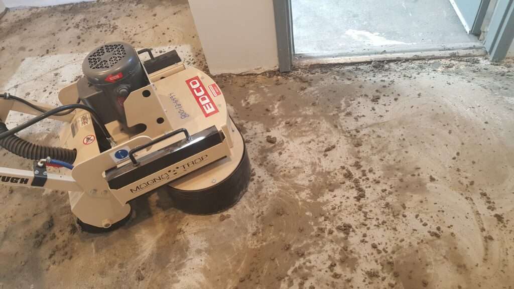 Grinding mastic off concrete floor