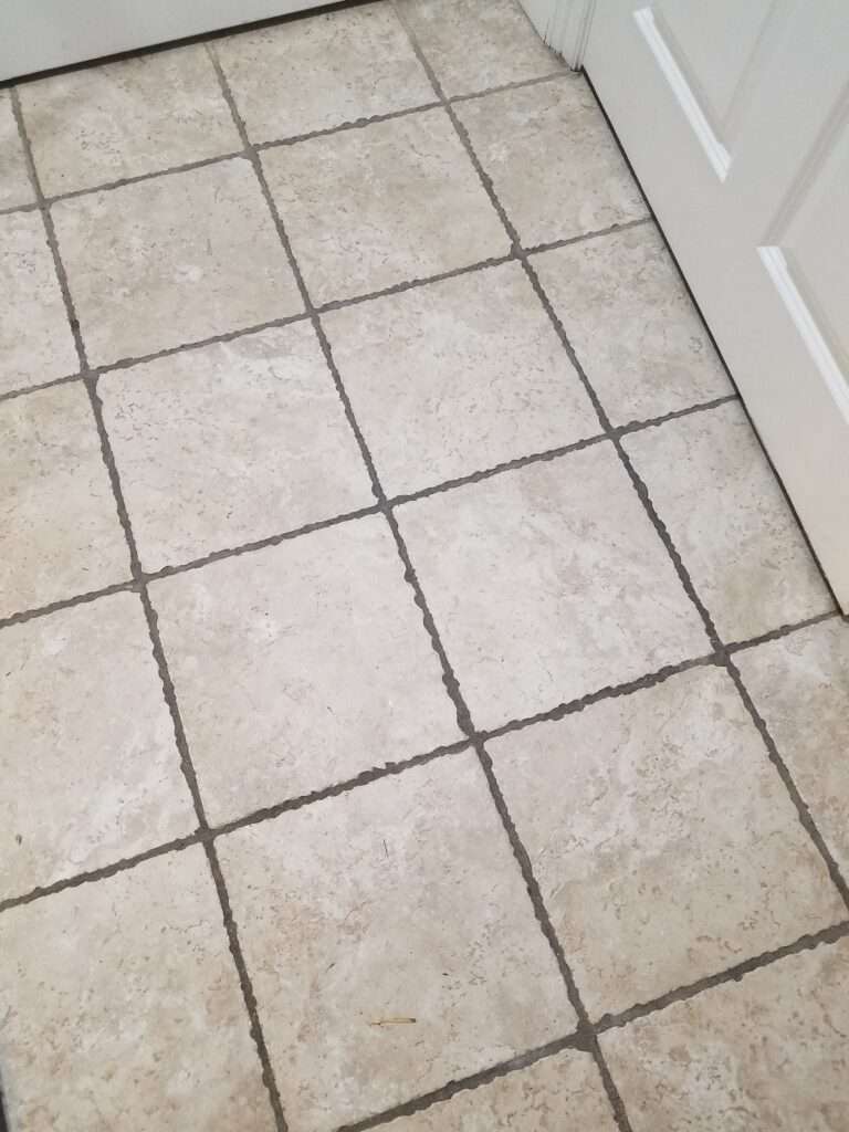 Tumbled marble floor looks soiled