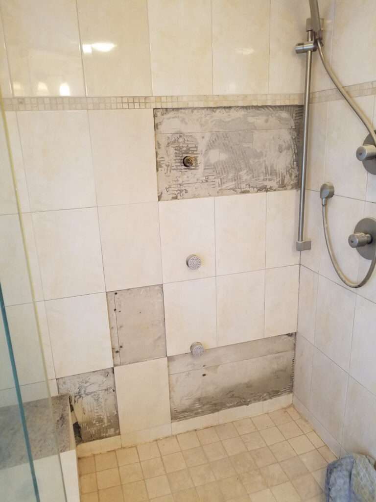 WET CEMENT BOARD DUE TO NO WATERPROOFING